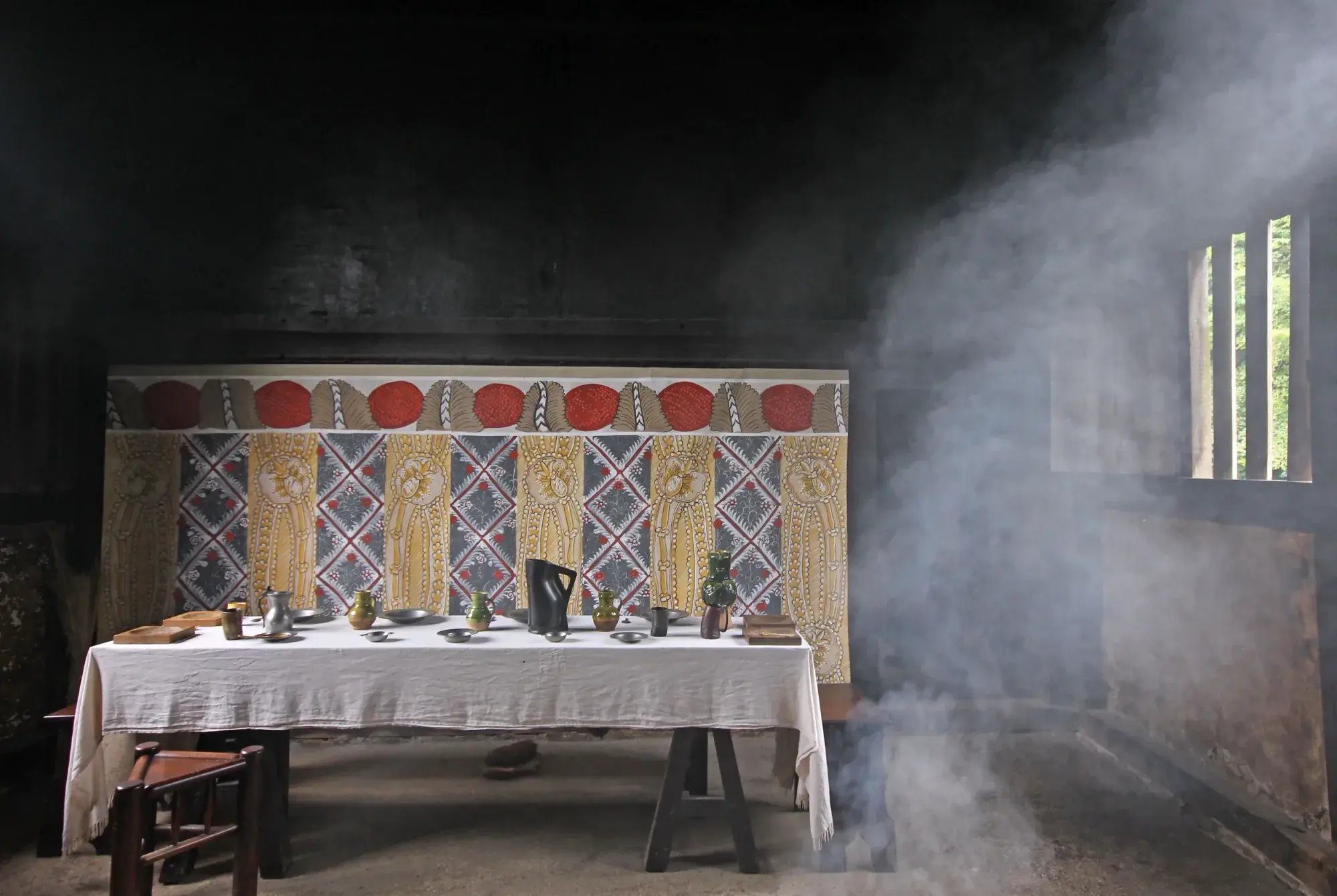 Melissa's bay leaf mural installed above a refectory table